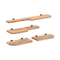 Set of five wooden shelves with black brackets on a white background